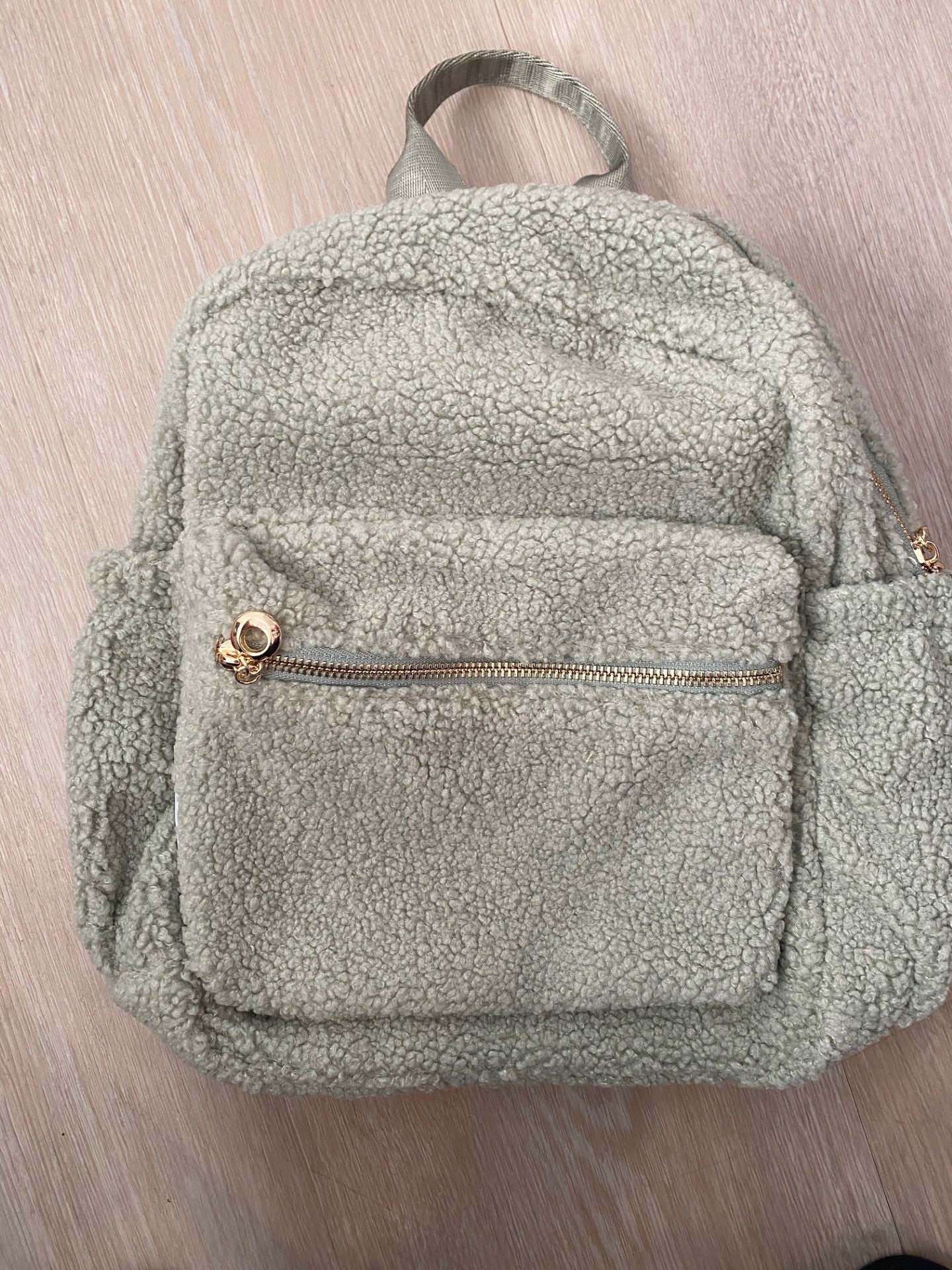 SAGE BACKPACK **SAGE BACKPACK WITH SLIGHT TEAR ON STRAP**