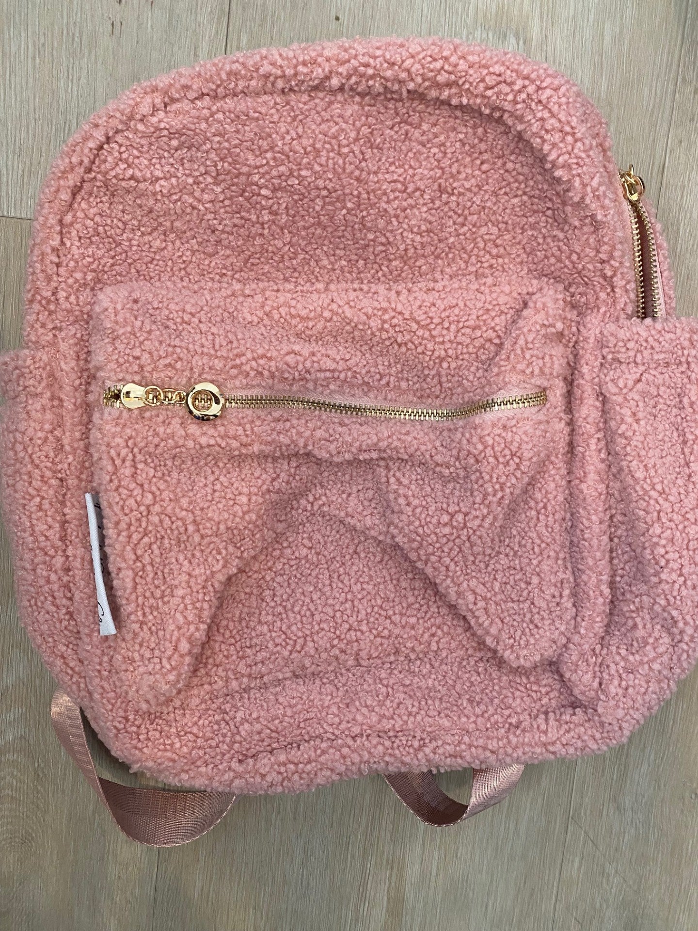 Pink backpack ** SLIGHT TEAR IN STRAP**