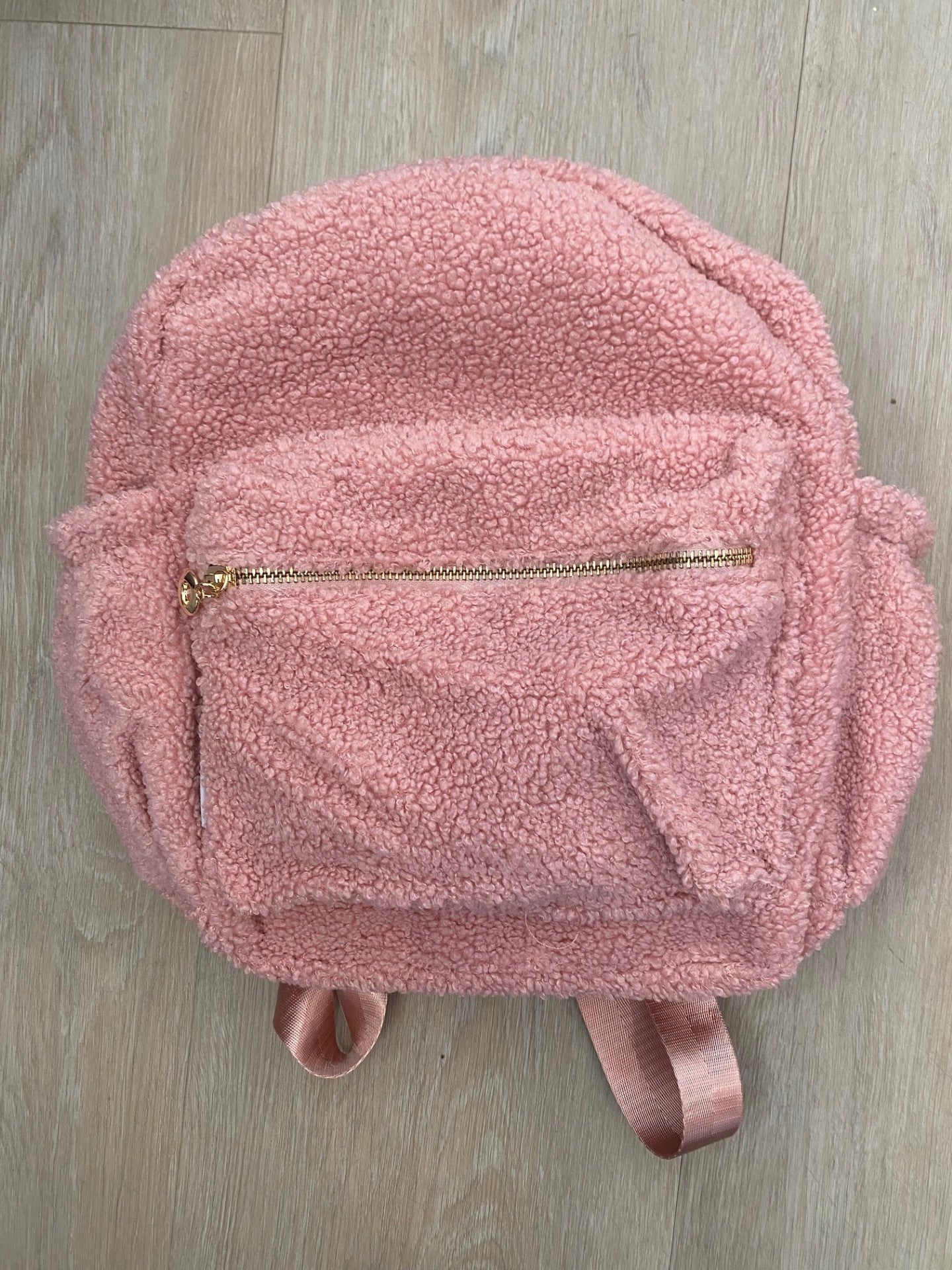 Pink backpack **SLIGHT TEAR IN SIDE POCKET**