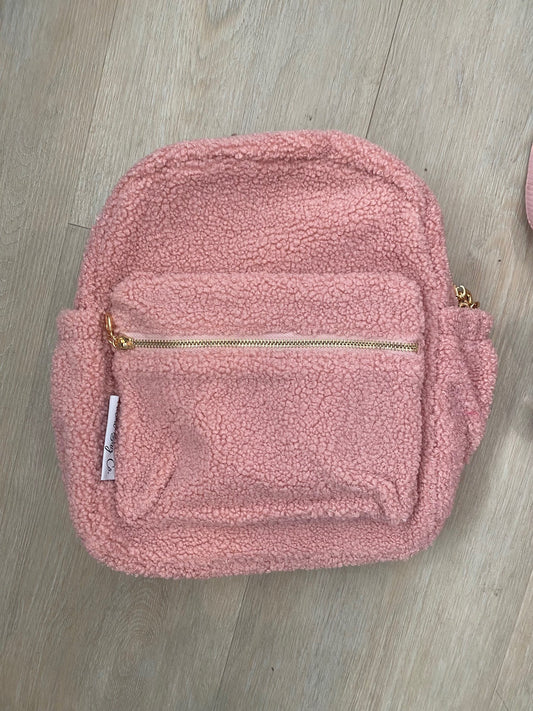 Pink backpack **SLIGHT TEAR IN TOP MATERIAL NEAR ZIP**