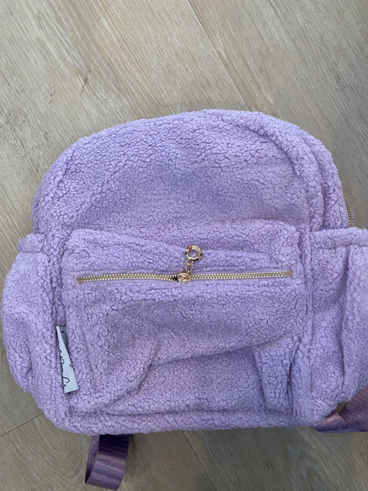 Lilac backpack **SLIGHT TEAR UNDER STRAP**